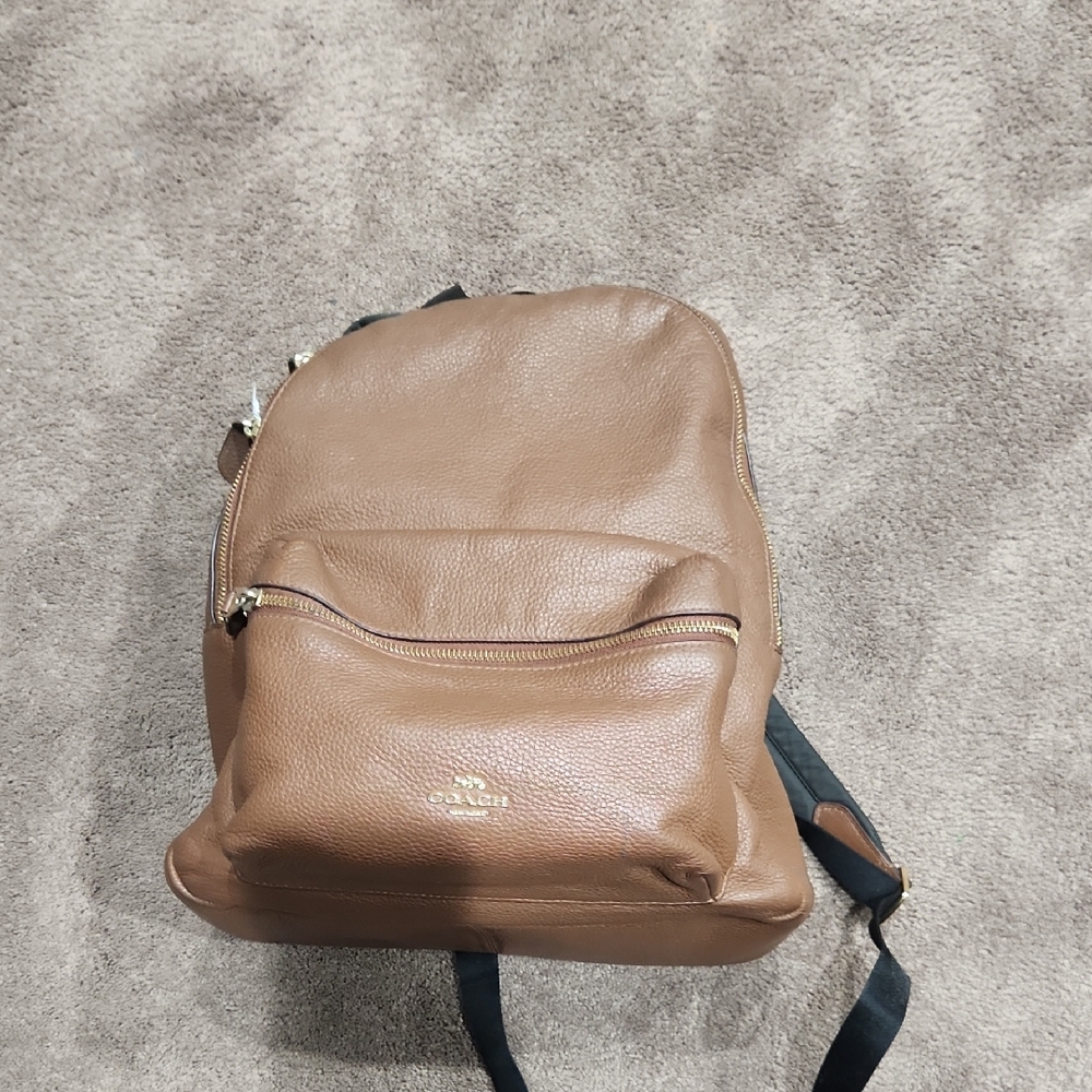 Coach Brown Leather Backpack with Structured Design